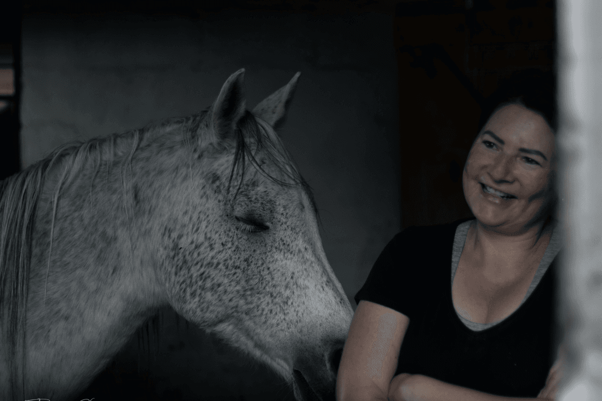 A member with her horse